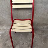 Red and white Tolix chair