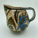 Pichet Paul Fouillen faience de Quimper decor geometrique signe