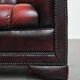 Classic cowhide Chesterfield button seat armchair in a beautiful red colour