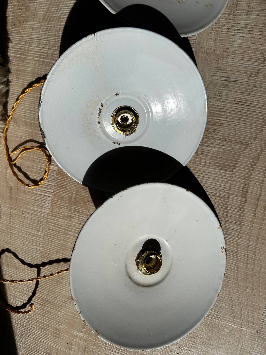 Trio of vintage green enamelled sheet metal lampshade pendants