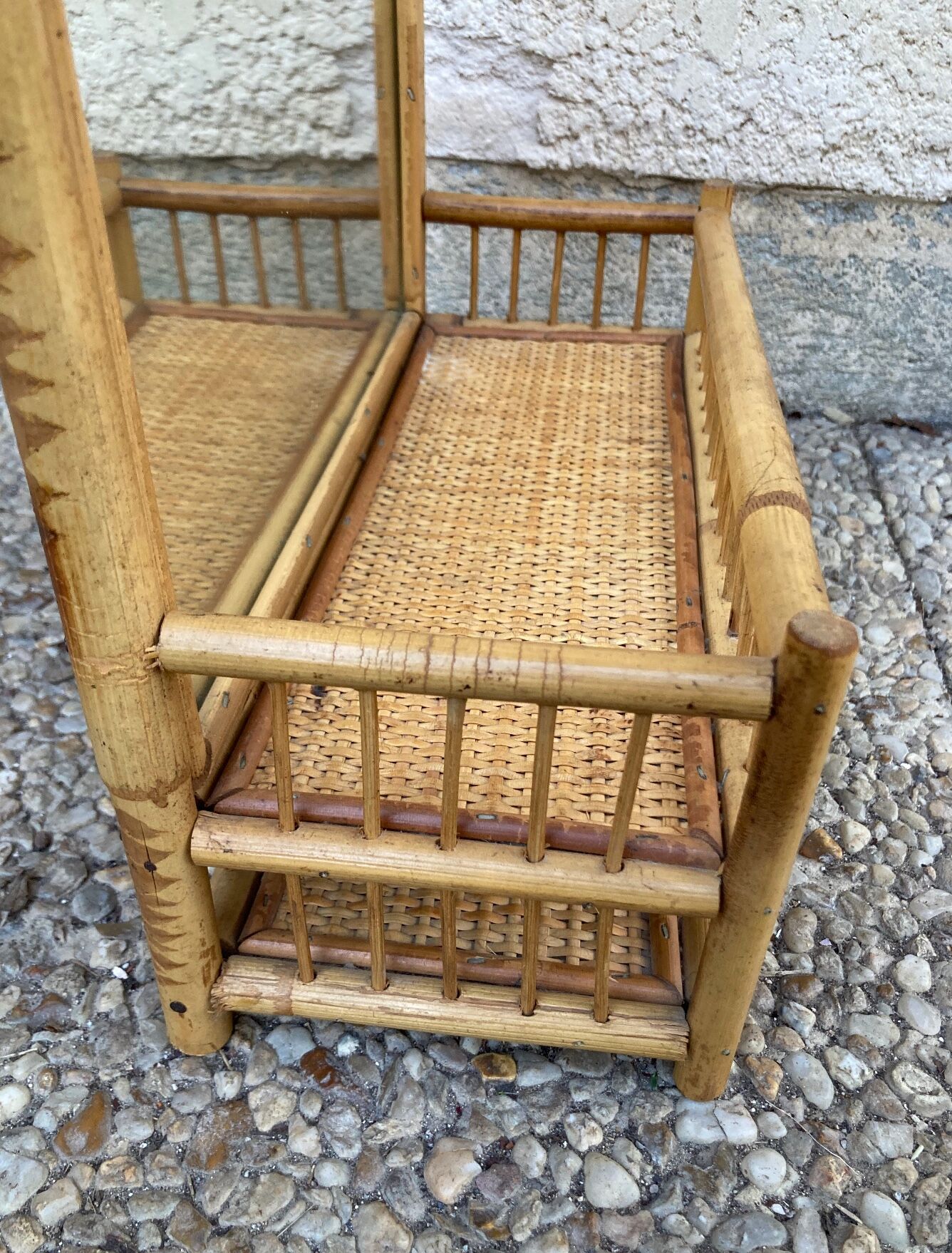 Vintage rattan wall shelf with mirror