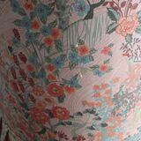 pair of toad armchairs in floral fabric.