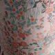 pair of toad armchairs in floral fabric.