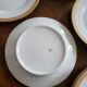 Lot of 8 small porcelain bread plates.