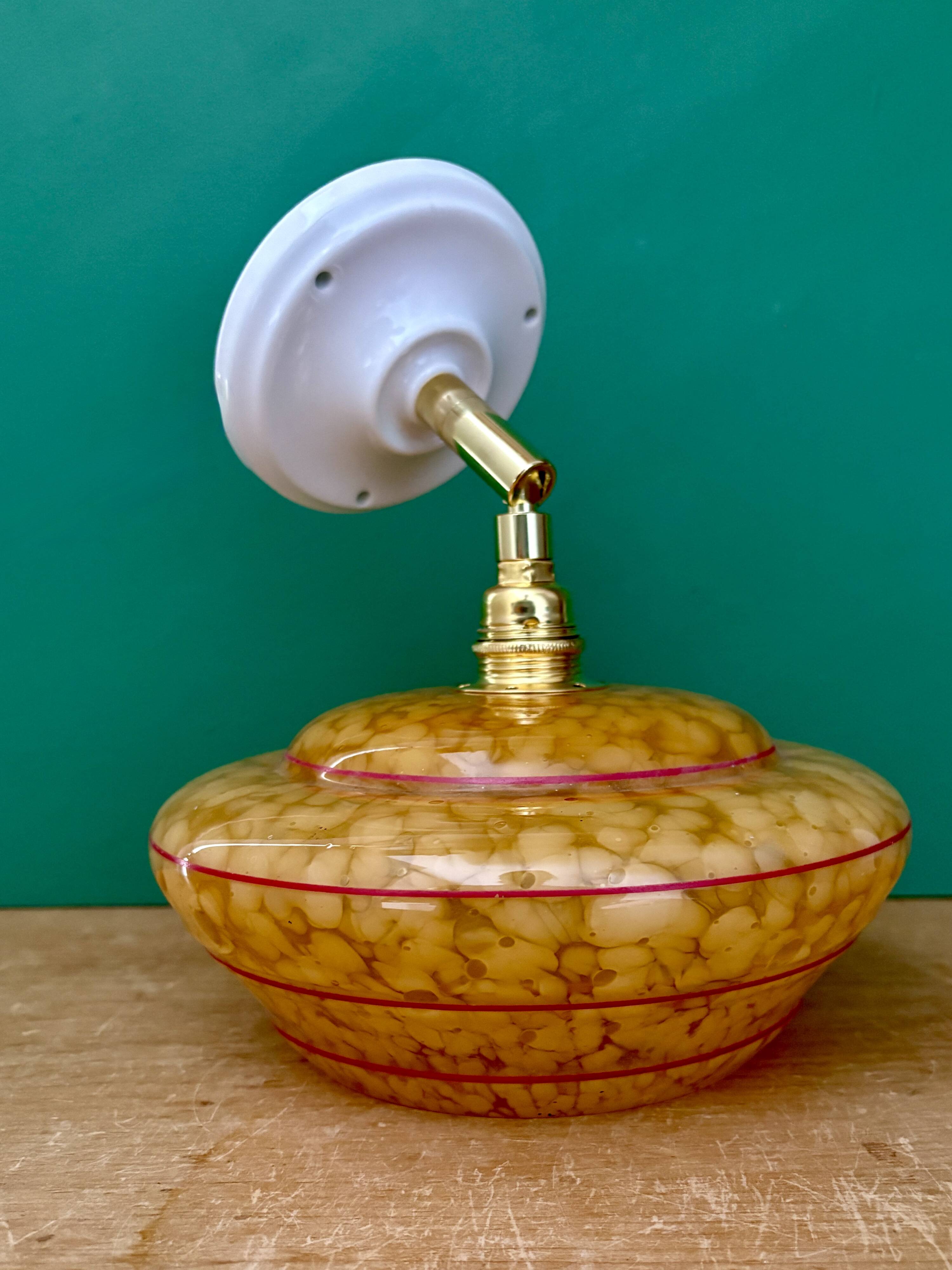 Vintage wall lamp with yellow clichy glass shade and red trim