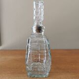Glass carafe in the shape of a perfume bottle
