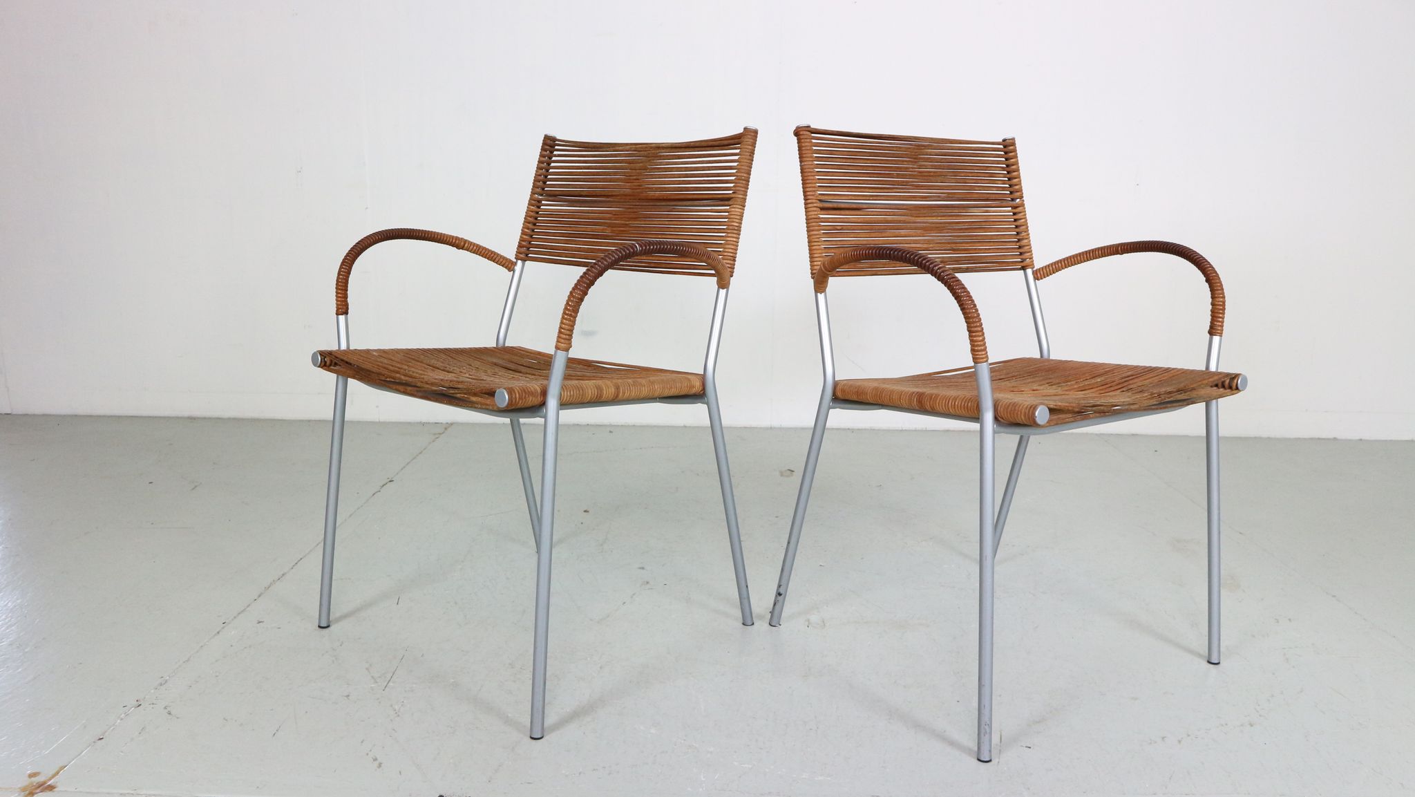 Set of 2 leather Mis B2 RVS armchairs by Tito Agnoli  for Pierantonio Bonacina