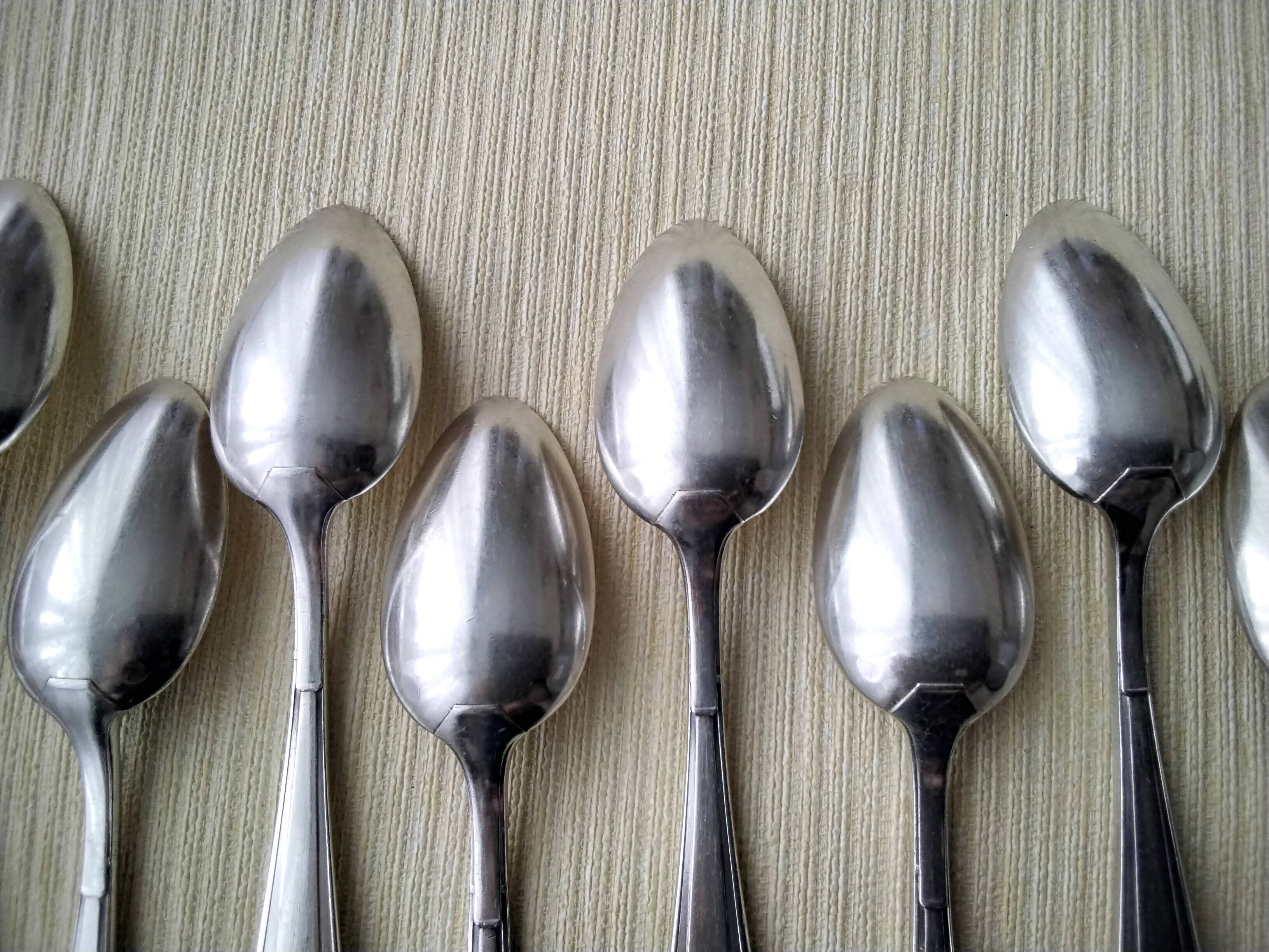 11 Cuillères à café en métal argenté Apollo