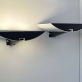 Pair of modernist wall lights, black and white lacquered metal, Italy 1980