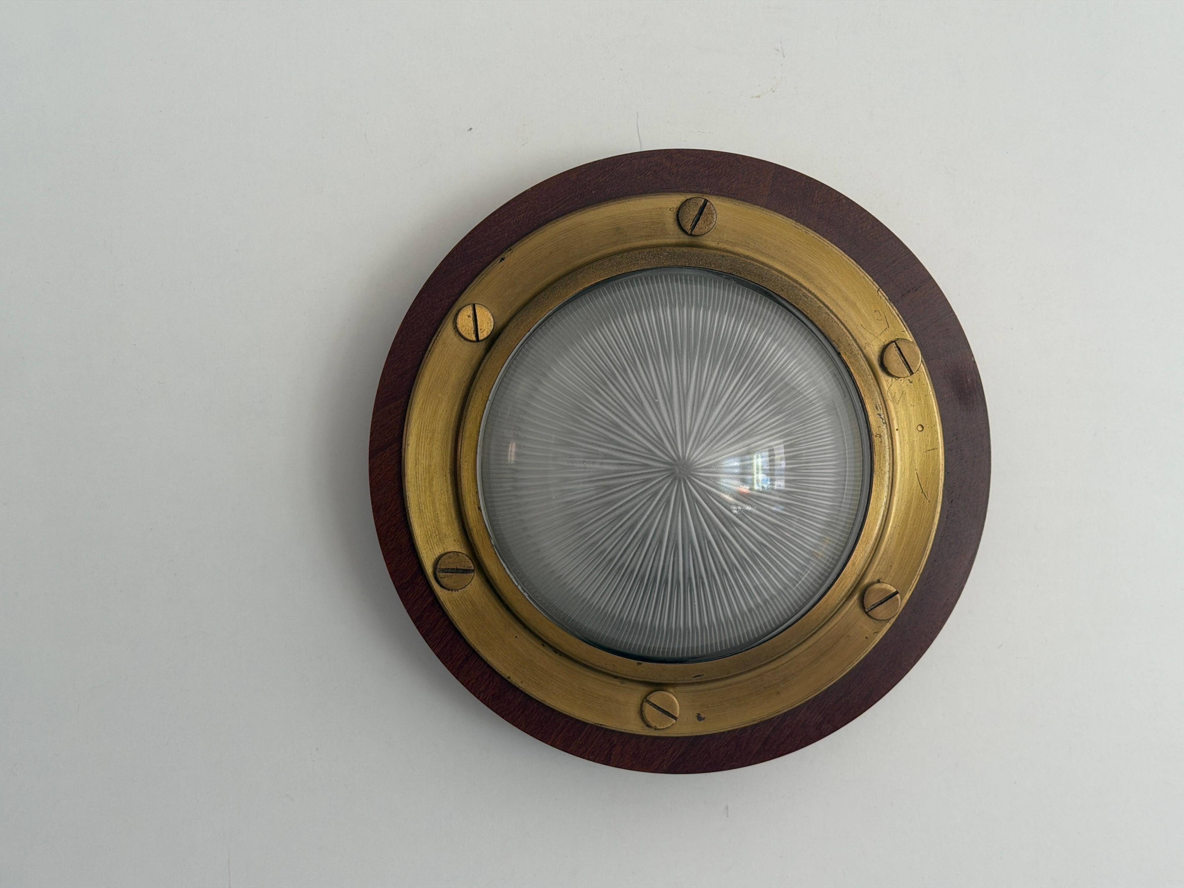 Pair of round glass wall lights, brass base and Wood Wood, 1960s, Italy.