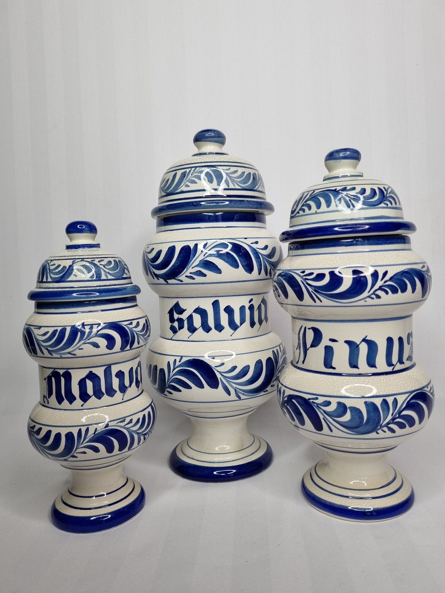 Set of three covered apothecary pots, Malva, Pinus, Salvia in glazed ceramic