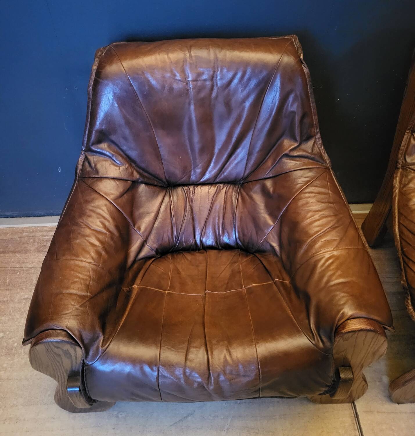 Pair of Vintage Brutalist armchairs from the 60s in leather and solid oak