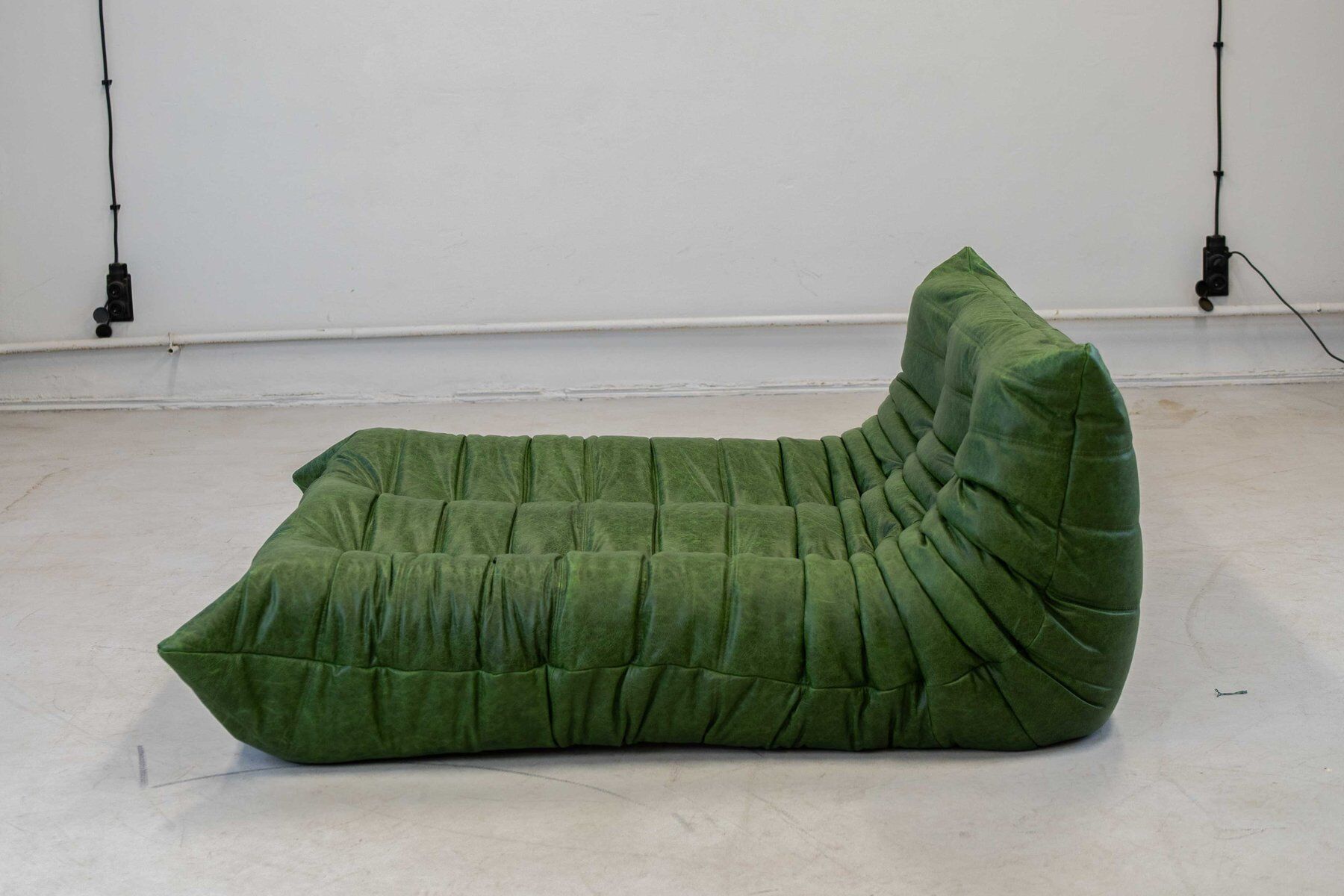 Togo chaise lounge in green leather attributed to Michel Ducaroy for Ligne Roset, 1974