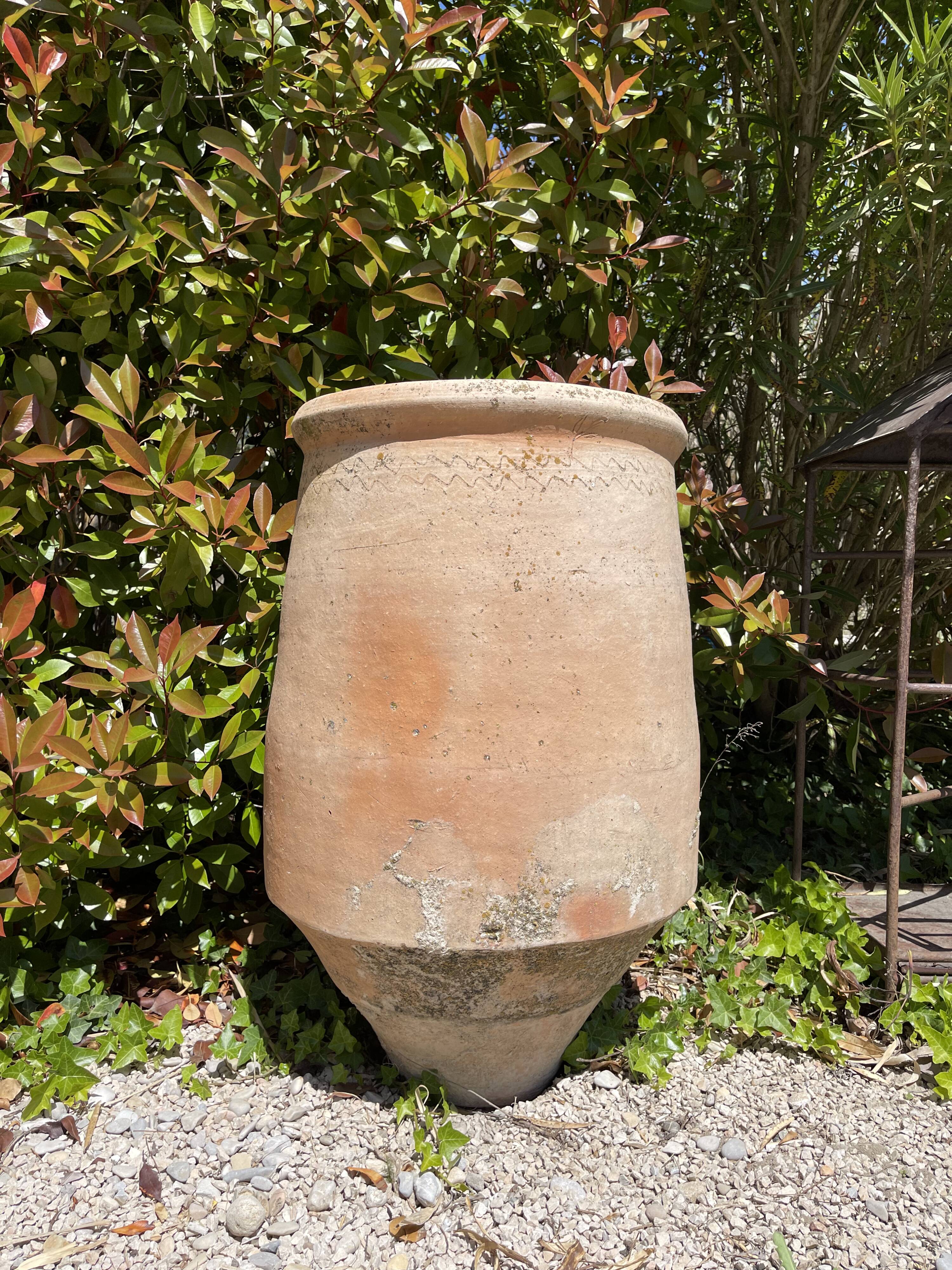 Ancient terracotta pottery jar