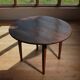 Round table in raw wood