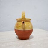 Old gargoulette pot in glazed terracotta