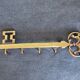 Key holder in the shape of a vintage key