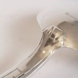 Silver plated metal service: 12 soup spoons, 12 forks and ladle.