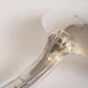 Silver plated metal service: 12 soup spoons, 12 forks and ladle.