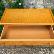 Dresser and its bedside table in rattan caning and vintage oak from the 1970s.