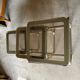 Brass nesting tables with smoked glass tops