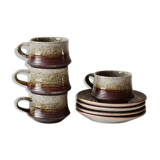 Cups and saucers in sandstone