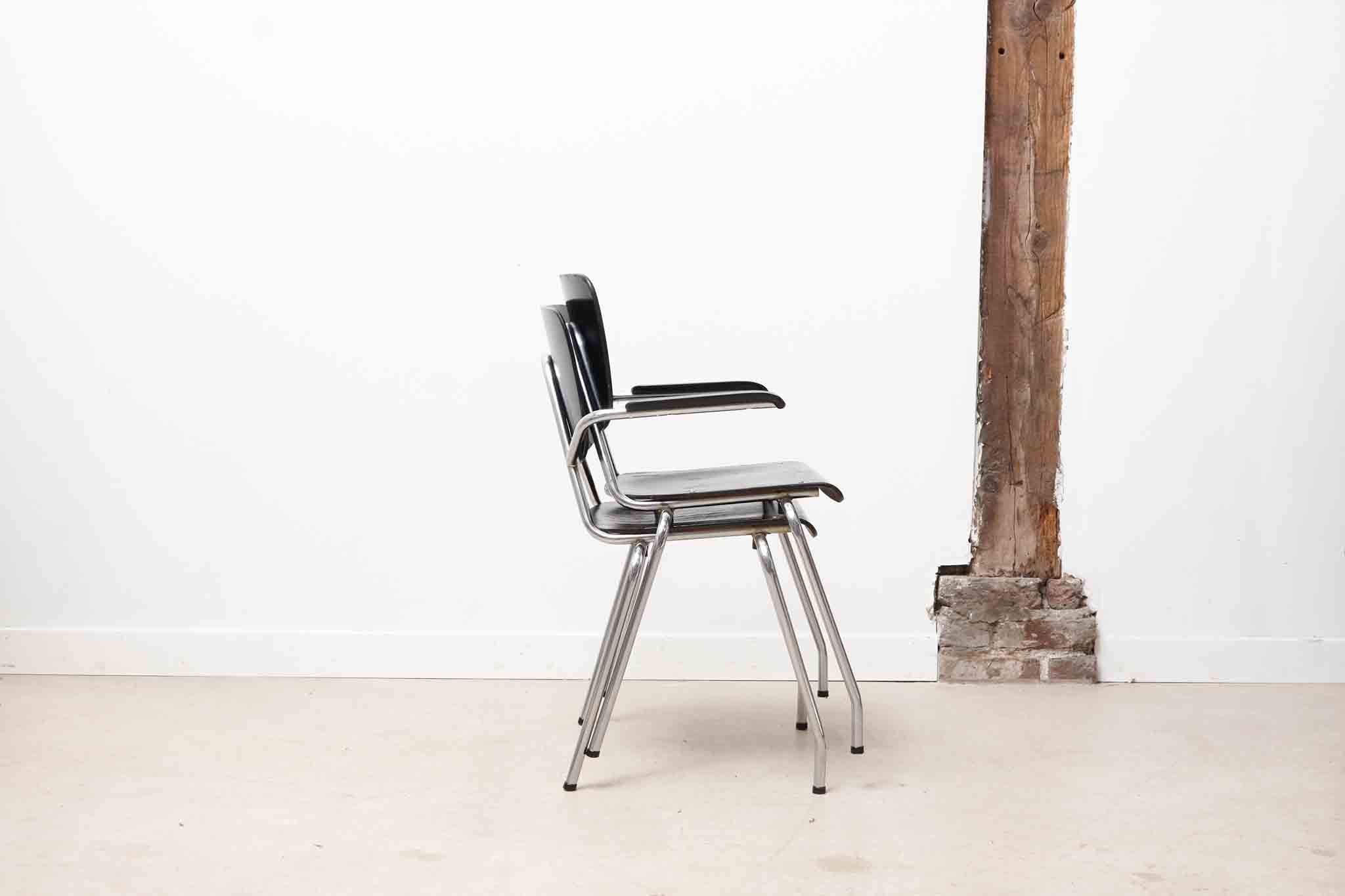 Vintage chair Kho Liang Black and metal with armrests