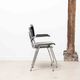 Vintage chair Kho Liang Black and metal with armrests