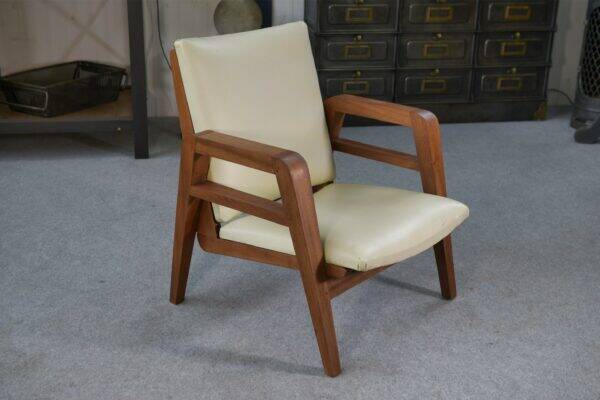 Modernist armchair in mahogany and skai 1940-1950