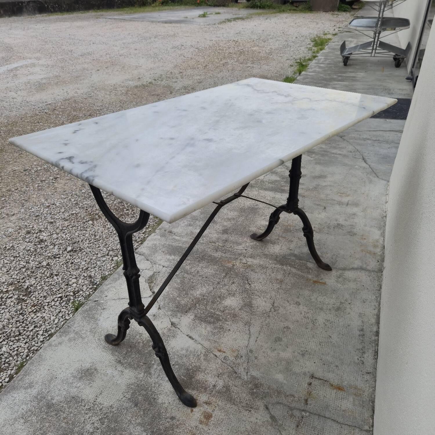 Antique cast iron and marble bistro restaurant table