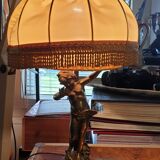 Brass cherub-laying lamp