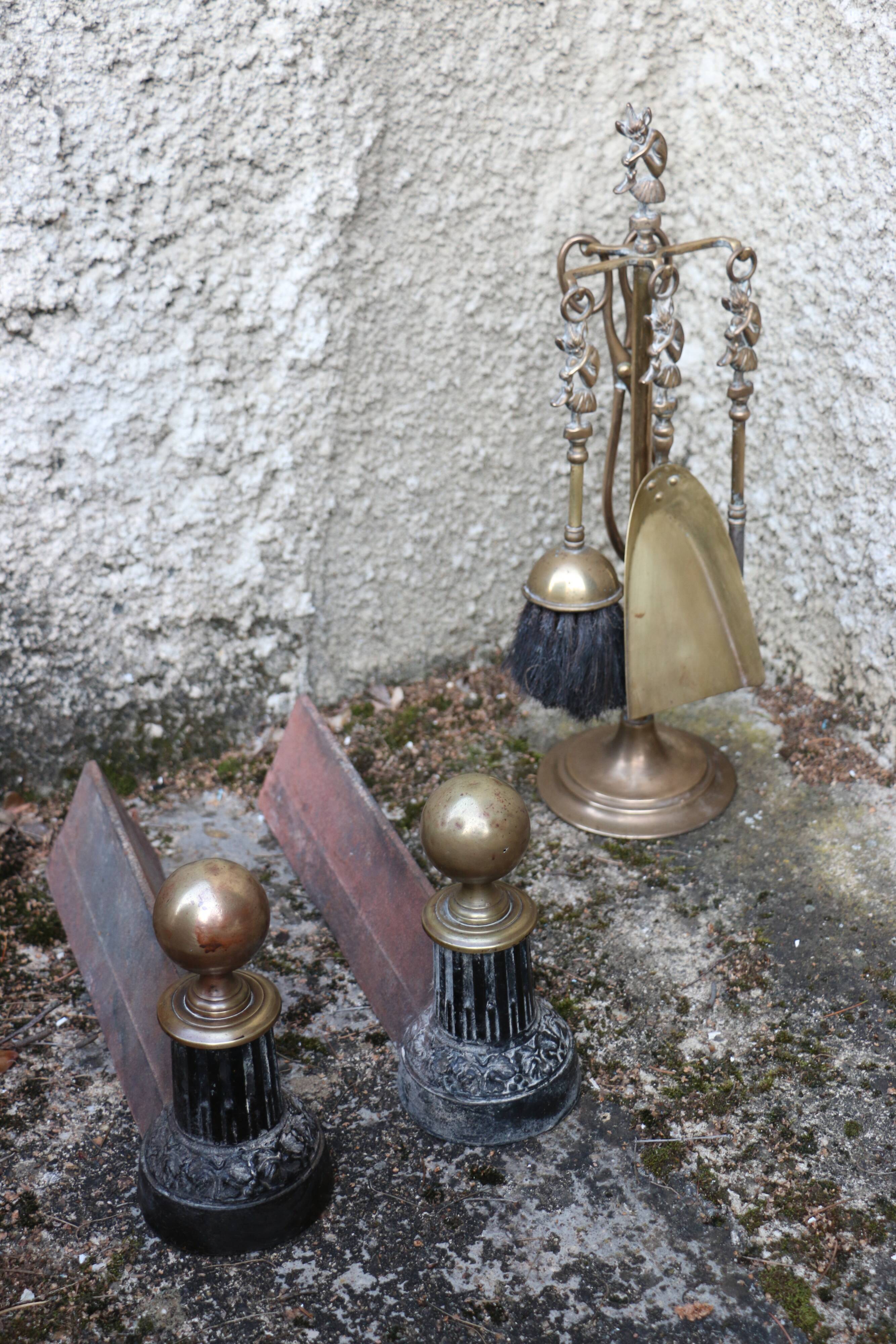 Brass fireplace servant with pair of cast iron pegs with vintage brass ball year 60