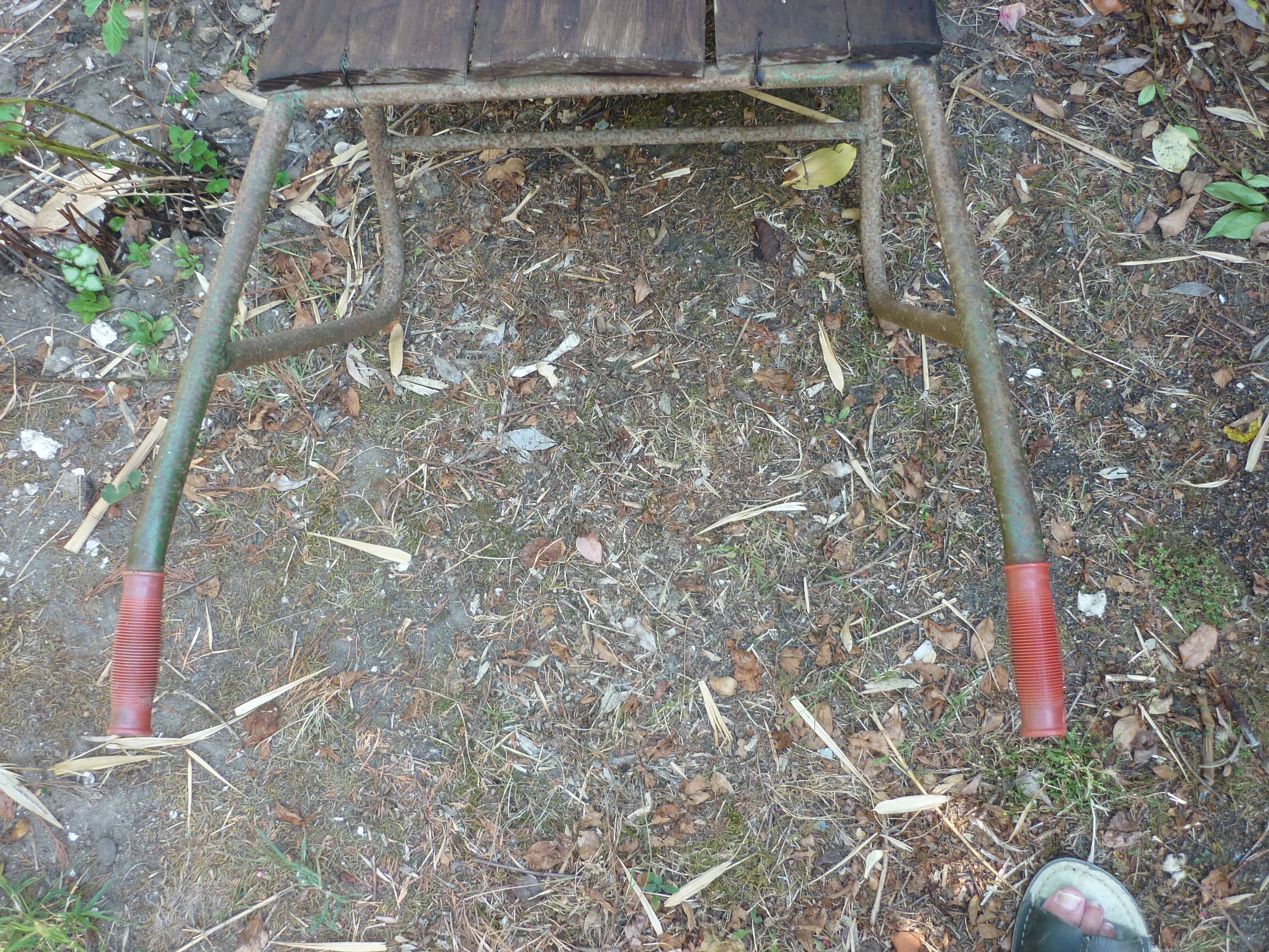 Former wooden and metal wheelbarrow