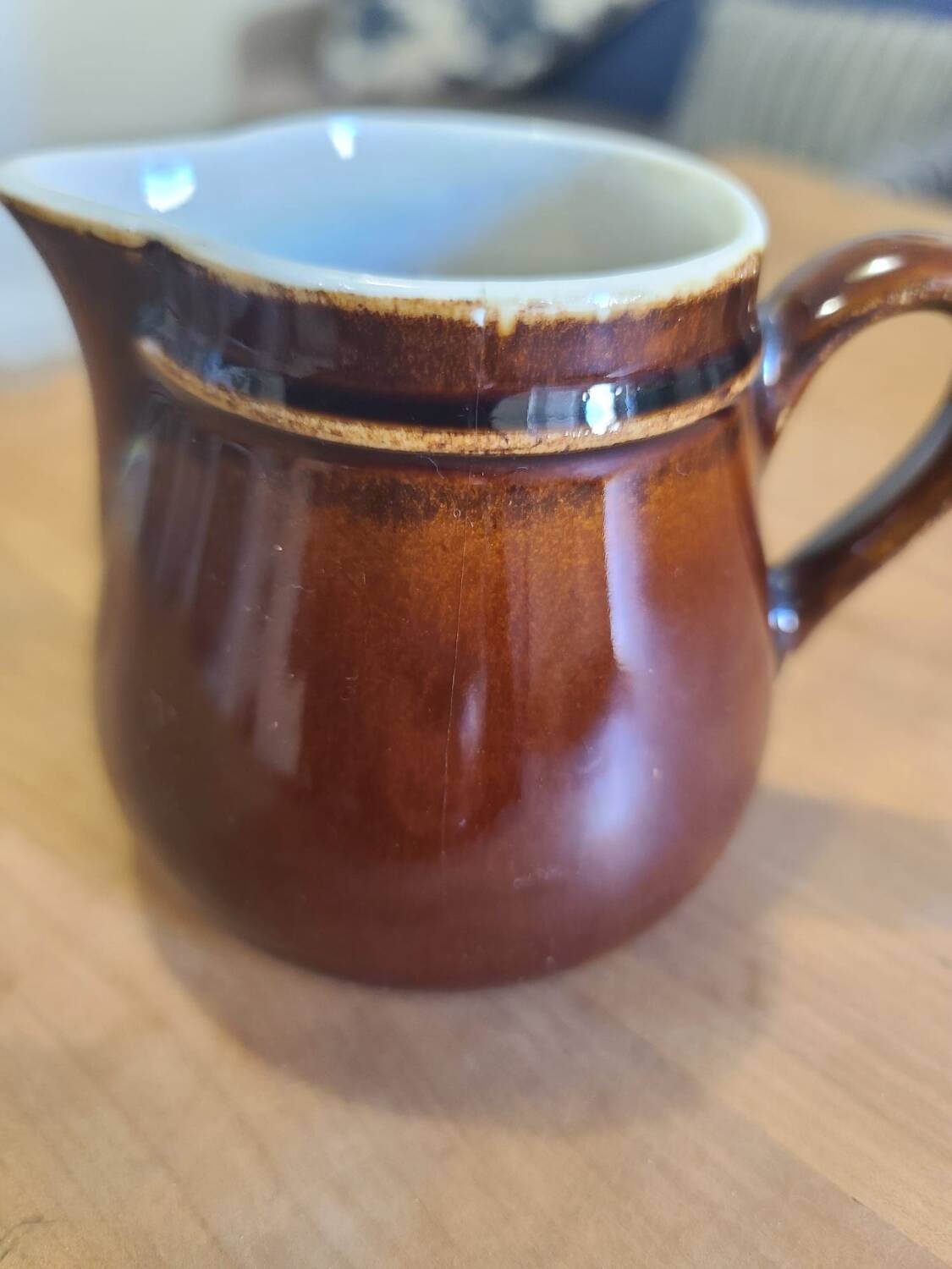 Brown ceramic milk jug