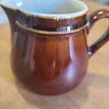 Brown ceramic milk jug