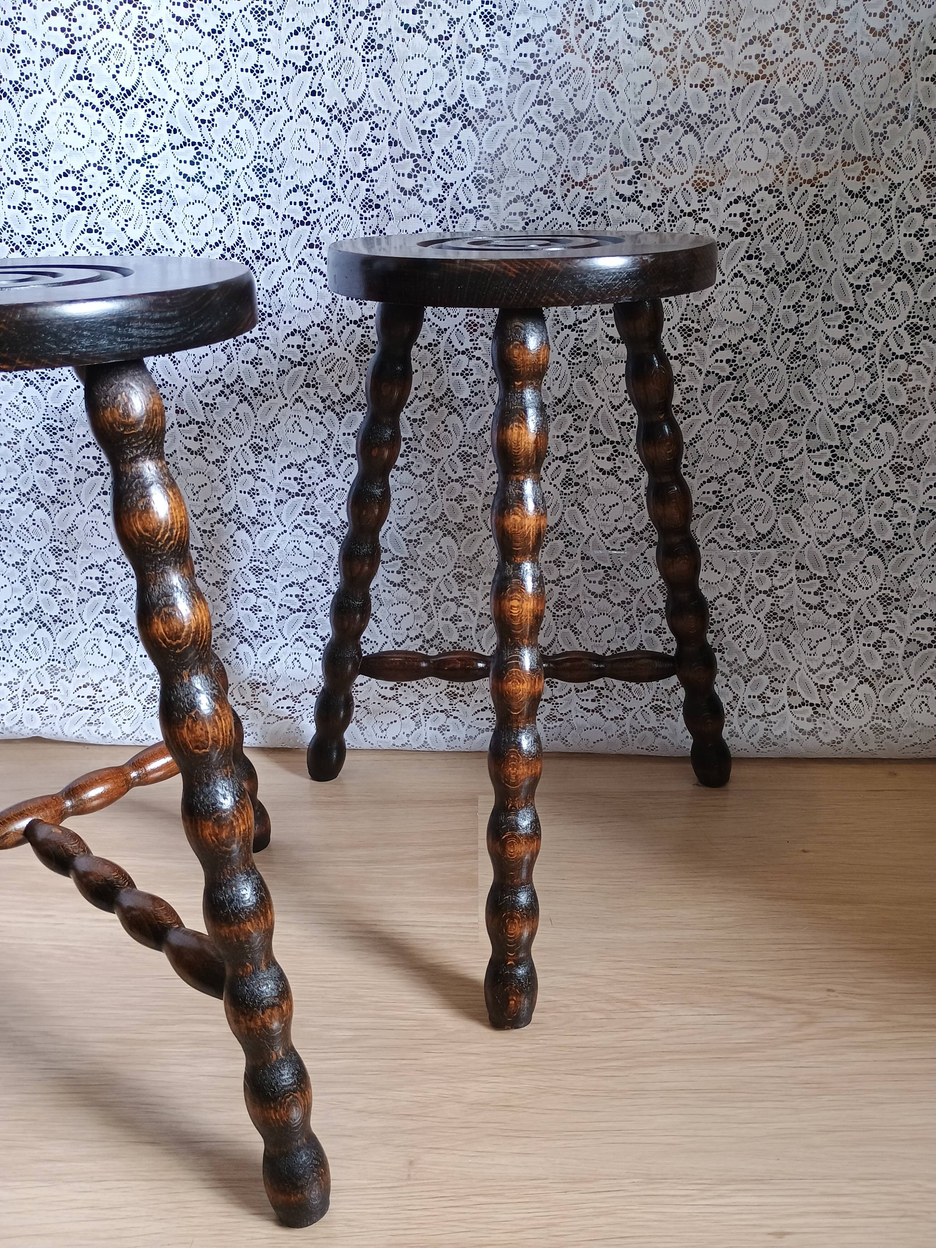 Pair of vintage turned wood tripod stools