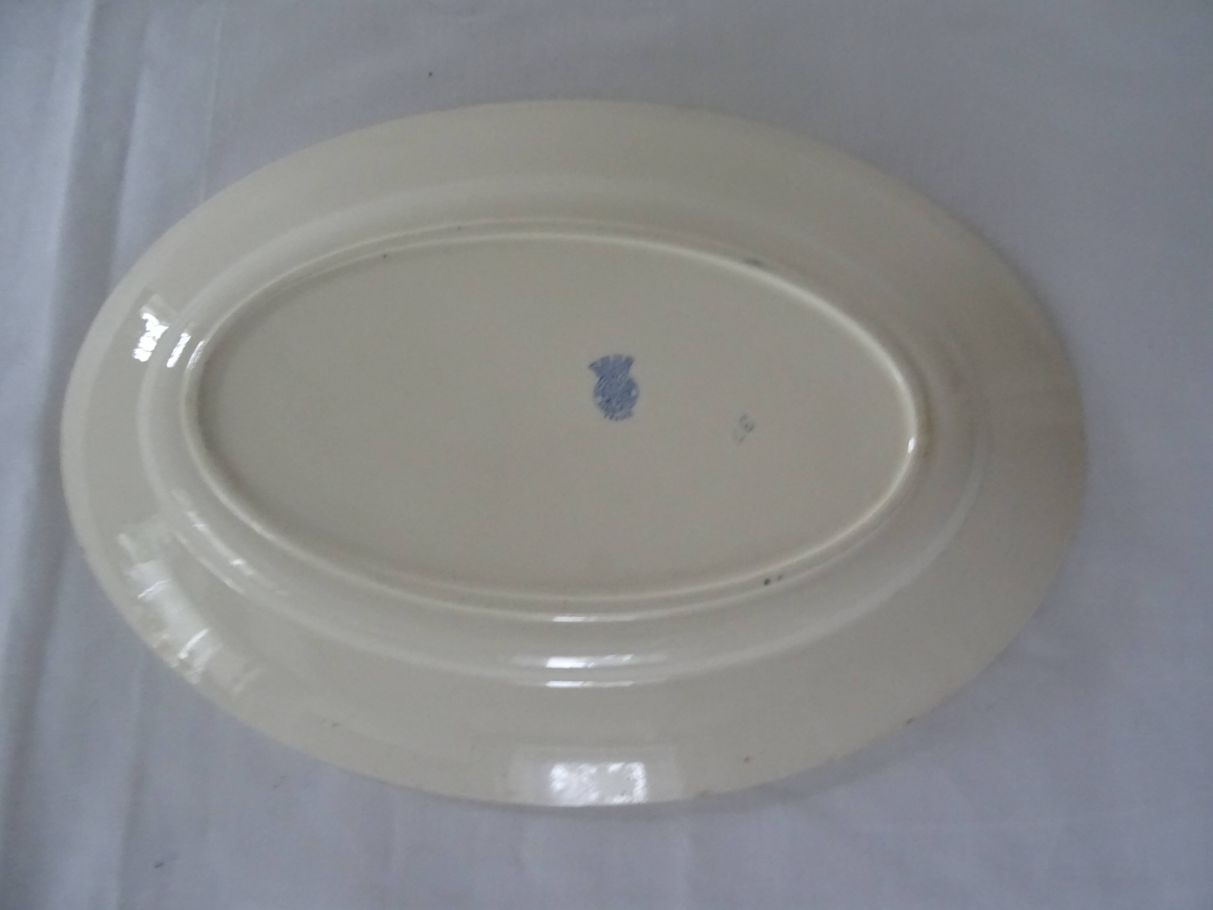 Oval flat earthenware blue flowers 519112 Badonviller