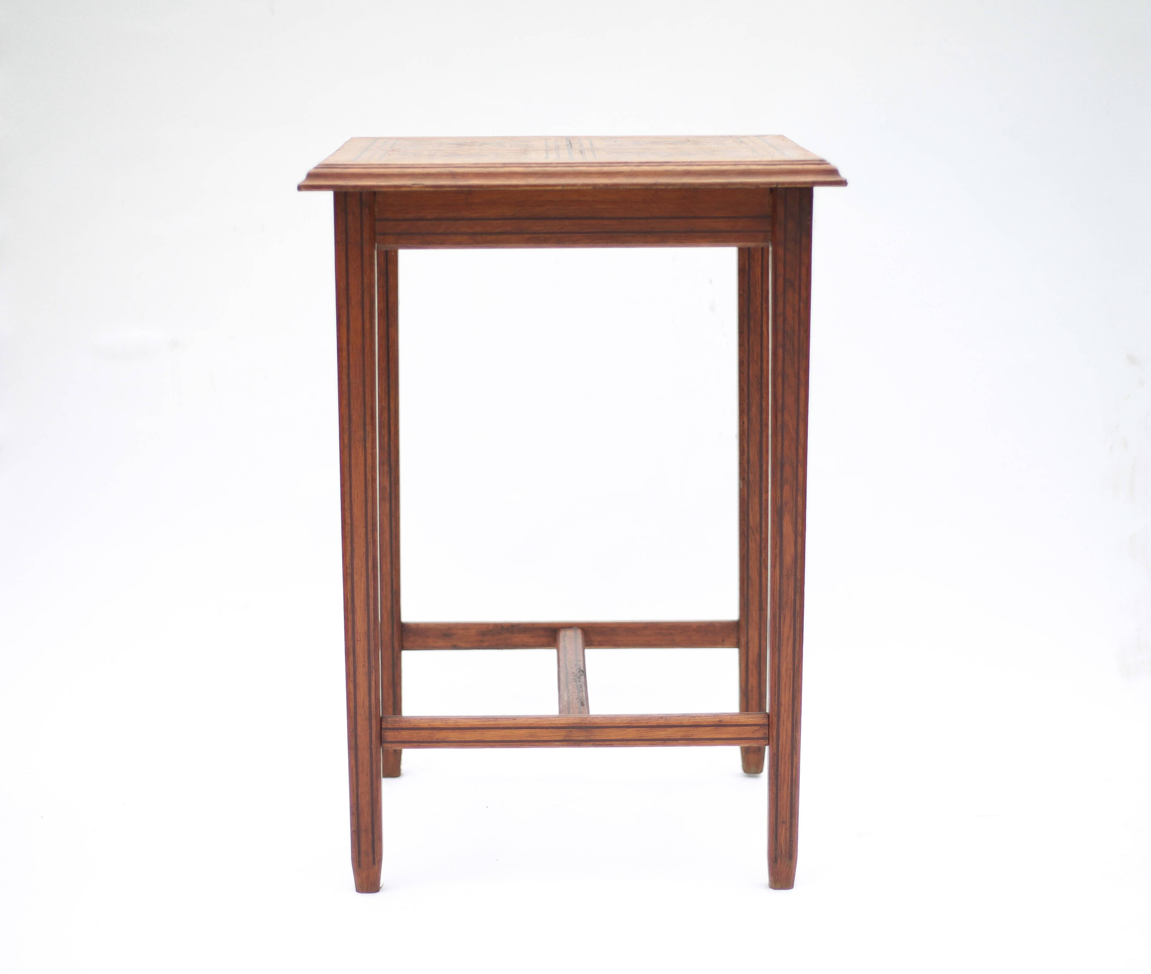 Wood table with marquetry, table with an antique parquet top, antique table.