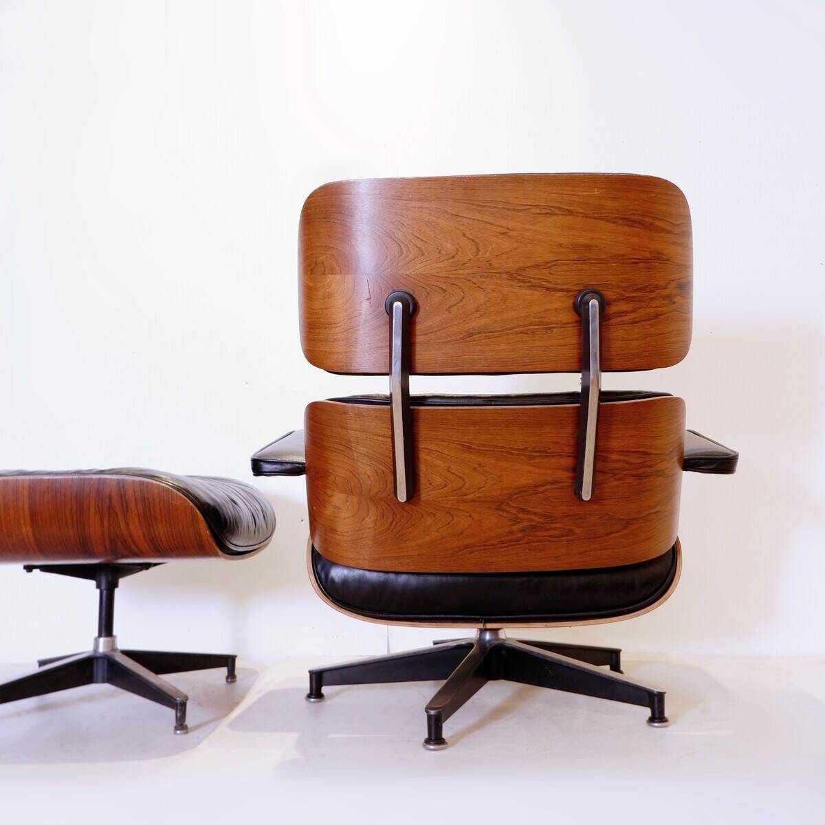 Mid-Century armchair and footrest by Charles & Ray Eames for Herman Miller
