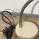 Vintage articulated industrial beige metal desk lamp