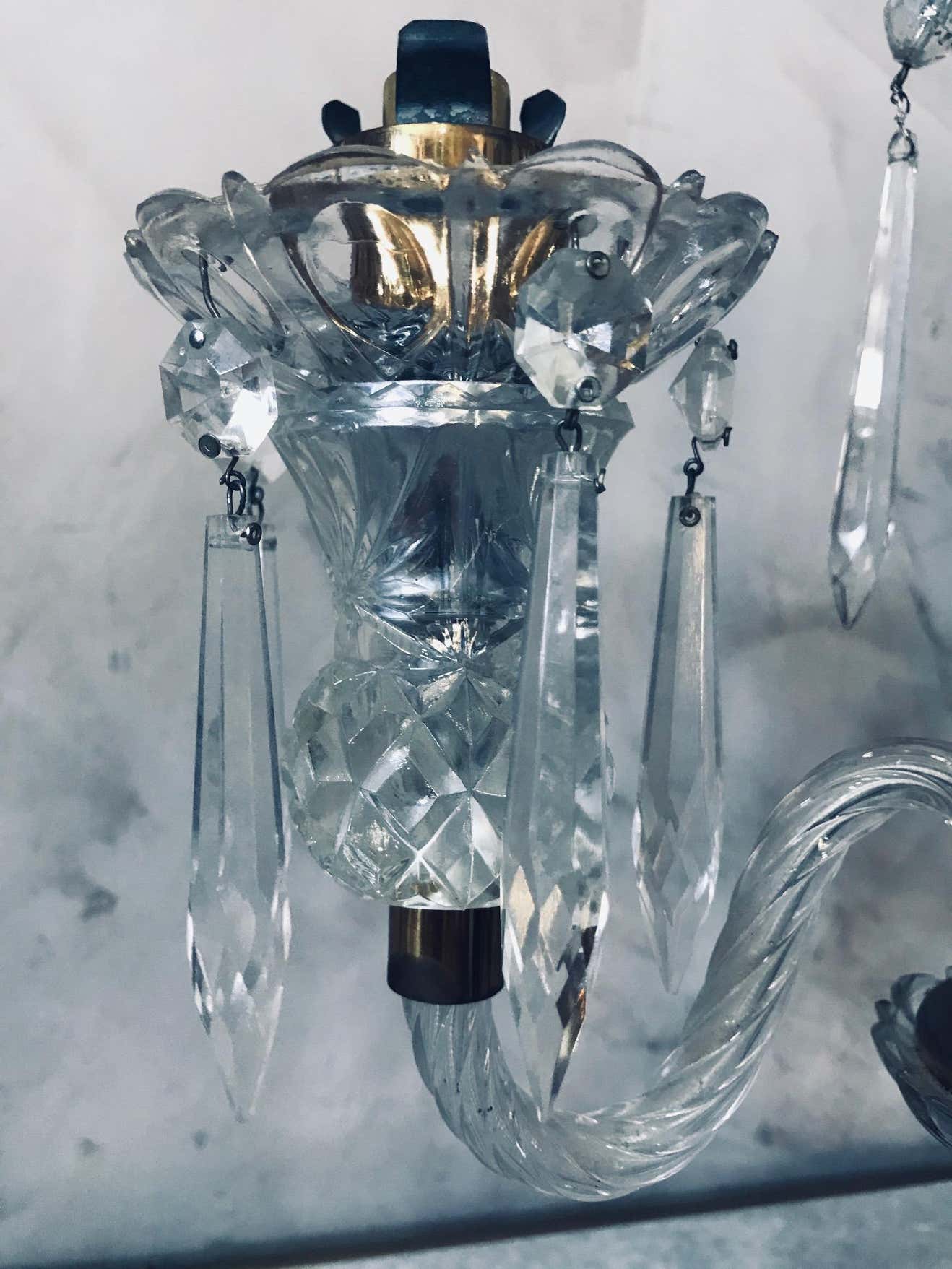 Pair of Sèvres candelabra in crystal and brass of the 20th century France 1950