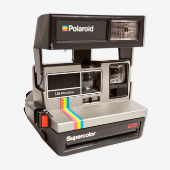 Polaroid Supercolor 635 in its original box with purchase paper and warranty