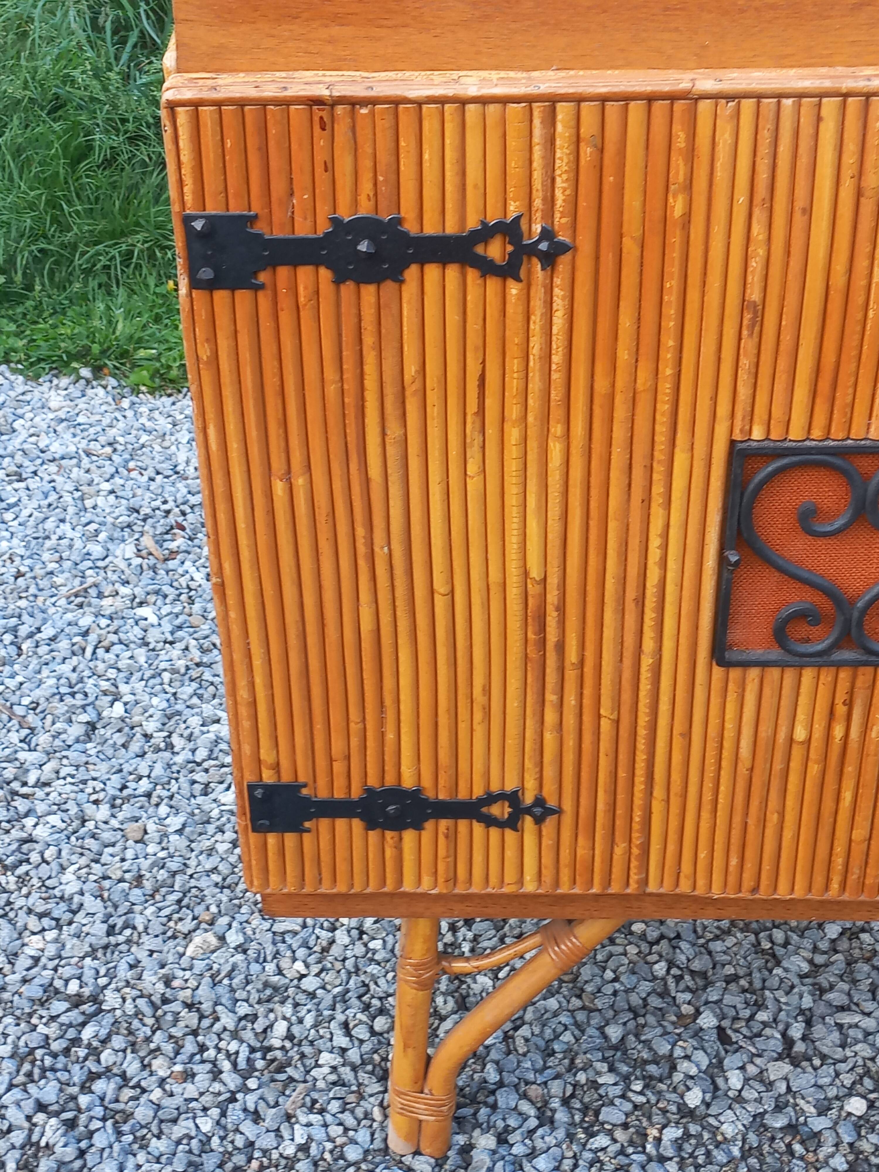 Bamboo and rattan enfilade attributed to Audoux and Minet.