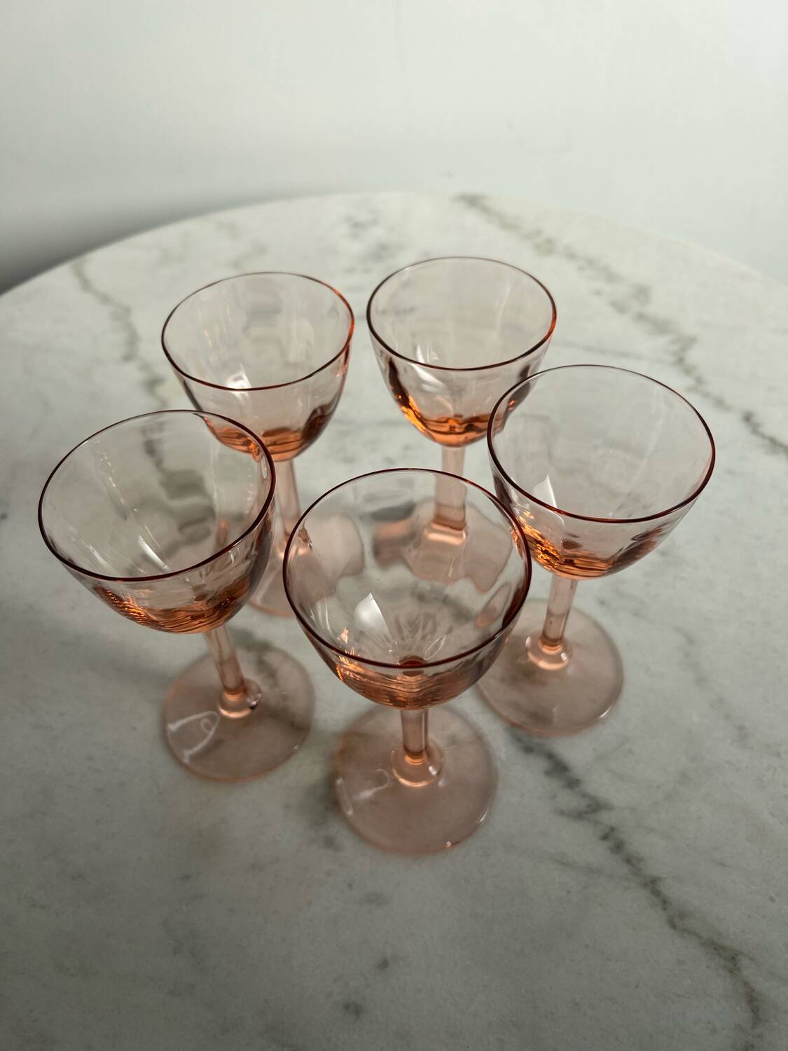 5 small pink glass stemmed glasses