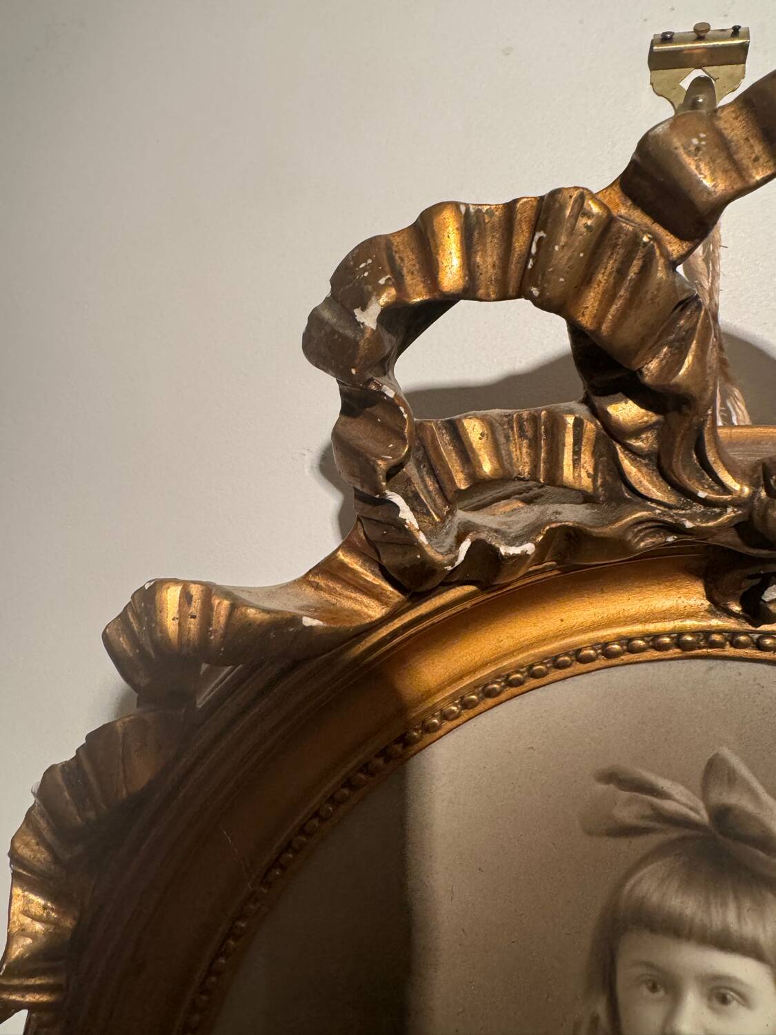 Old photograph, young girl with ribbon, 19th century