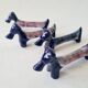 Set of 8 vintage ceramic knife rests, retro dog design.