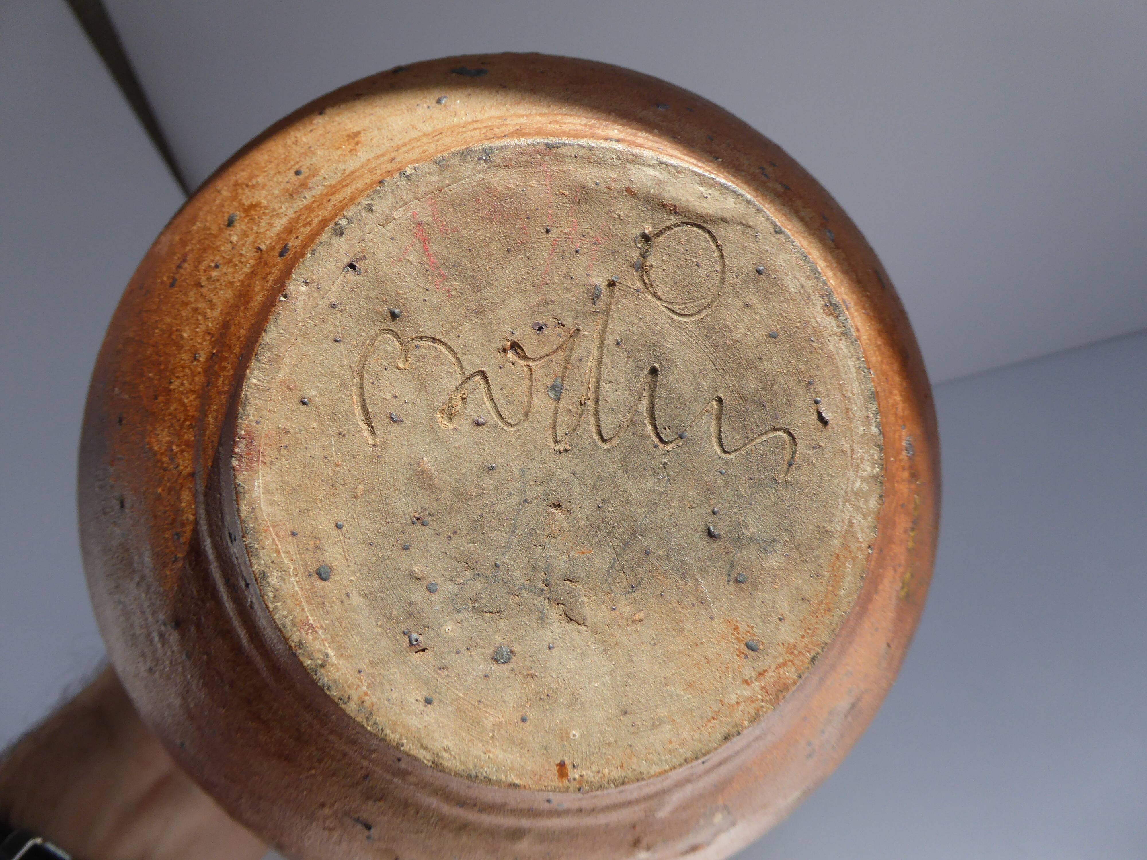 Signed vernissé sandstone pitcher