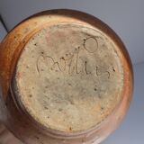 Signed vernissé sandstone pitcher
