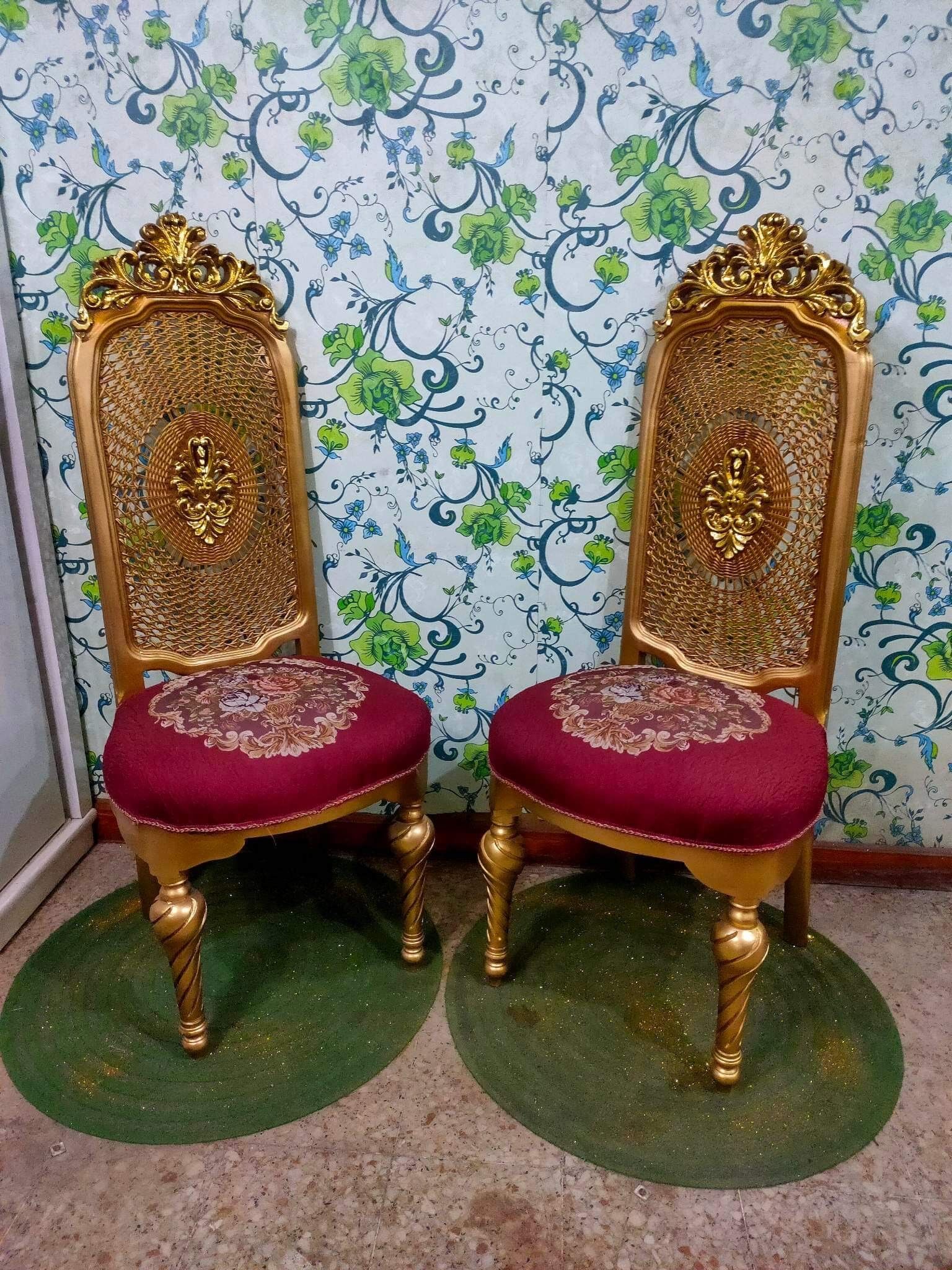 Pair of gilded chairs with Louis XV style floral pattern