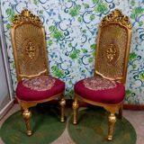 Pair of gilded chairs with Louis XV style floral pattern